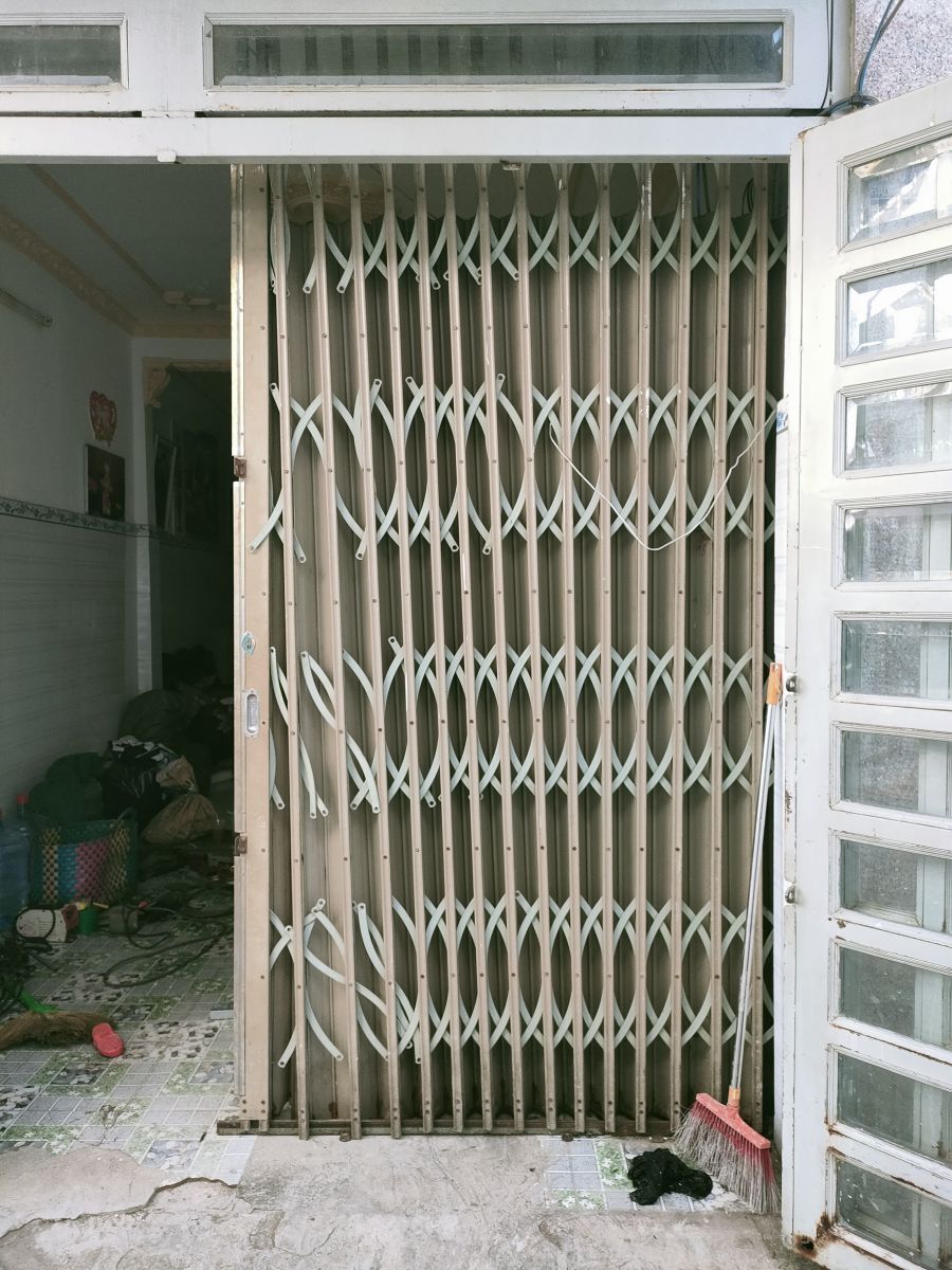 sửa cửa kéo huyện nhà bè